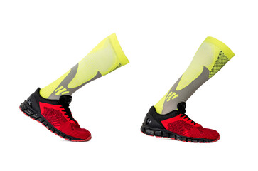Side sneakers and socks running on white background