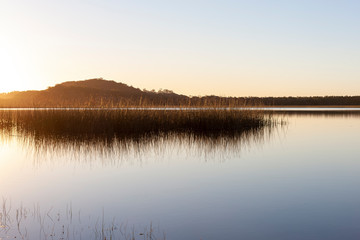 Sunrise over the calm lake