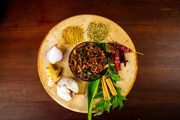 Spicy Maldives fish dish - (dried fish sambol/sambal) with leafy green water spinach (Kankun )stir fries. Asian food kitchen.