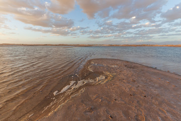 Sunset landscape of salt lakes Ala Shan Desert or Tengger Desert, Inner Mongolia, Northwest of China
