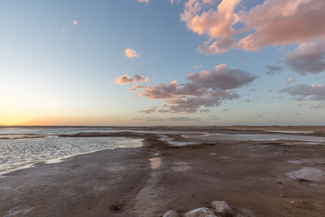 Sunset landscape of salt lakes Ala Shan Desert or Tengger Desert, Inner Mongolia, Northwest of China