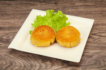 Vegan cuisine - Potato cutlet in the plate