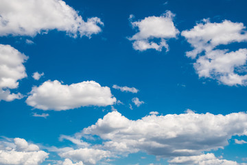 Naklejka na ściany i meble Images of a blue sky with white clouds