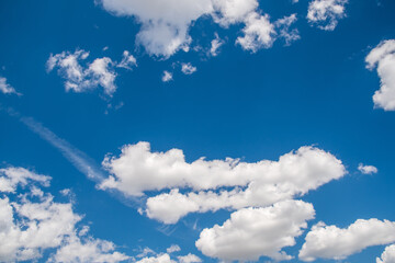 Images of a blue sky with white clouds