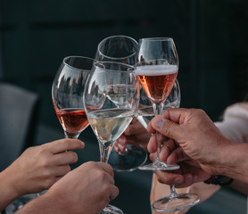 Glasses of white and pink sparkling wine on the table at the restaurant. Special wine tasting.