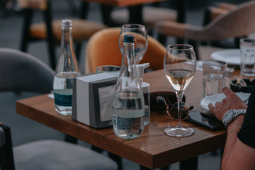 Glasses of white and pink sparkling wine on the table at the restaurant. Special wine tasting.