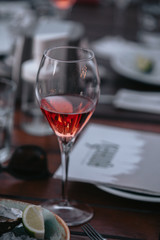 Glasses of white and pink sparkling wine on the table at the restaurant. Special wine tasting.