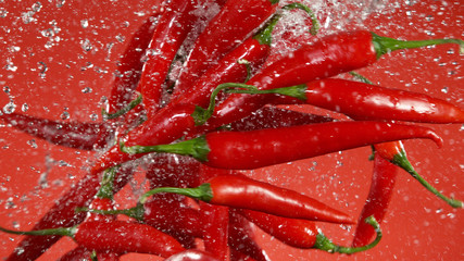 Freeze motion of flying chilli peppers in the air