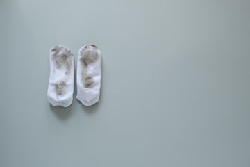 dirty socks isolated on gray background