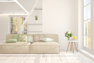 Obraz premium White stylish minimalist room with sofa. Scandinavian interior design. 3D illustration
