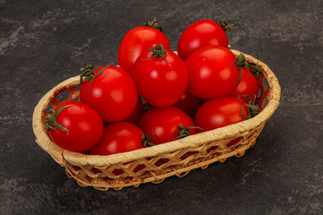 Ripe juicy cherry tomato in the bowl