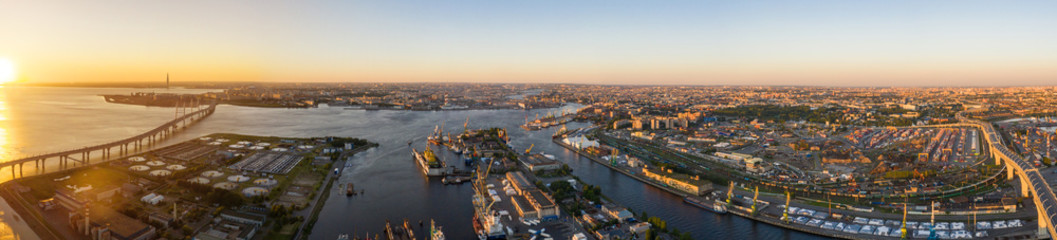 Fototapeta premium High-speed toll road, highway bypassing the city center St. Petersburg, the central section of the western high-speed section. A beautiful sunset over the Gulf of Finland