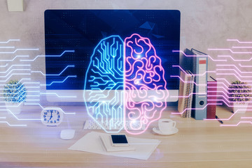 Double exposure of desktop with computer and brain drawing hologram. Artificial intelligence...