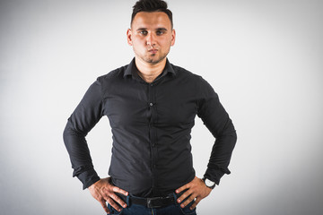 young emotional man shows hand gestures, isolated on a white background there is a place for the inscription text 