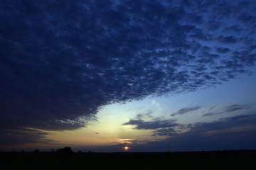 The sun at sunset. Spring in the foothills of the Western Urals.