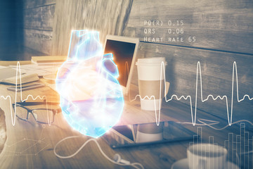 Desktop computer background and heart drawing. Double exposure. Medical study and healthcare concept.