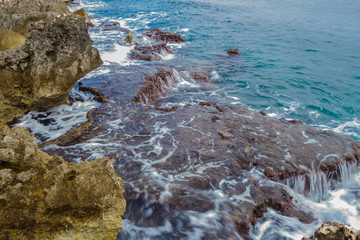 Coastline rocks washing by sea waves. Classic view for Mediterranean shoreline untouched by human...