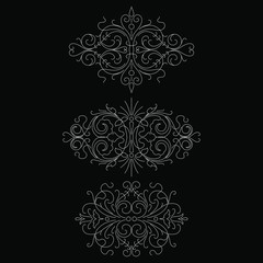 Calligraphic design elements isolated on black background set 2