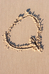 Q - Alphabet letter written on sand