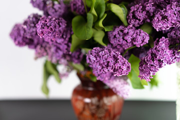 Bouquet of fresh lilacs in a vase