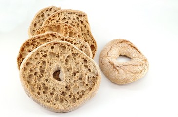 Friselle, or frise, a ring shaped type of twice-baked bread . White background