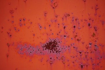 Brightly colored metal background with rust, metal background texture with bright copper red color with vintage textured design