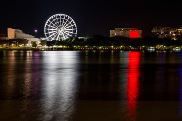 Nightscape view of Brisbane city with famous ferris wheel