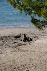 Athens, Greece, August 2020: A sand castle by the sea