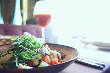 salad in cafe interior, asian cuisine, abstract in restaurant background