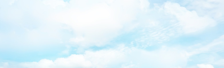 Naklejka na ściany i meble white clouds on blue sky background, abstract seasonal wallpaper, sunny day atmosphere