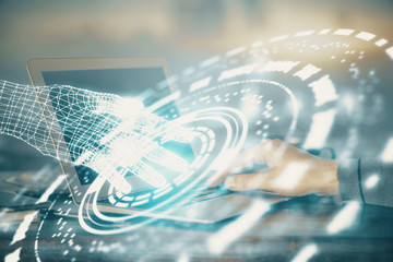 A man working on Laptop with technology theme drawing. Concept of big data. Double exposure.