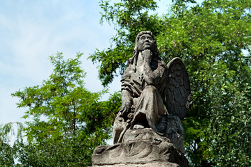 Angel statue in a park in Kamianets-Podilskyi, Ukraine.