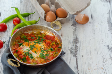 Traditional turkish food menemen with copy space.