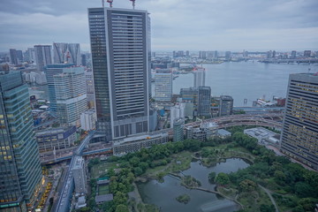 urban city skyline aerial view under cloudy sky in Tokyo, Japan