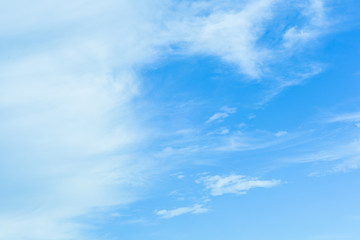 Fototapeta premium Blue sky background with white clouds