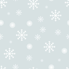 Seamless background with snowflakes. Winter blue endless pattern with falling snowflakes. Vector.
