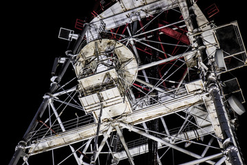 Metal tower transmitter of radio and TV signals, equipment for mobile communication