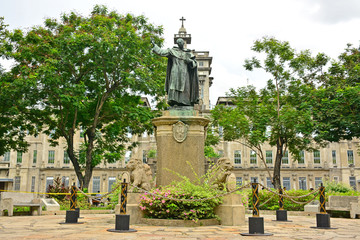 Fototapeta na wymiar University of Santo Tomas Miguel de Benavides statue in Manila, Philippines