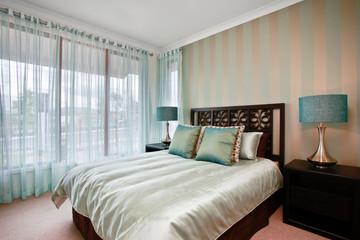 Bedroom design in a luxury modern house 