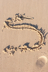 S - Alphabet letter written on sand 