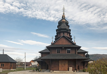 Naklejka premium St Elias Wooden Church, is a well-preserved example of traditional Hutsul architecture, in Dora, Yaremche, Ukraine