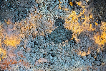 Rusty texture. Grunge background. Dry ground and old metal.