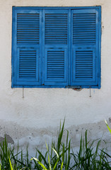 blue window on white wall