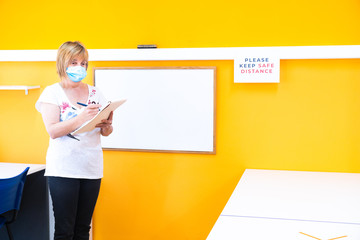 Going back to school after coronavirus pandemic with the necessary preventive measures. Teacher...