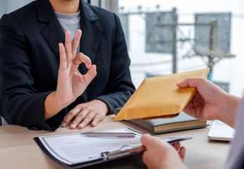 Bribery and Corruption Concept, businesspeople agree to receive bribes with partners.