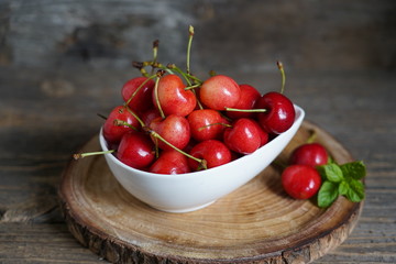 Red sweet cherries. Fruit bird cherry, (Prunus avium) plant species belonging to the rosaceae family