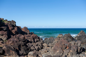 Fototapeta na wymiar Scenic view of seascape with large rocks on coastline