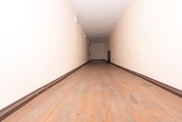 empty white room with wooden floor