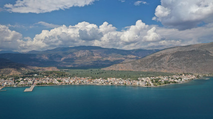 Fototapeta na wymiar Aerial drone panoramic photo of picturesque seaside town of Itea built in the slopes of mount Parnassos, Fokida, Greece