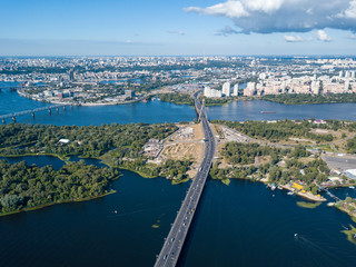 Fototapeta premium Aerial drone view. Bridge over the Dnieper river in Kiev.